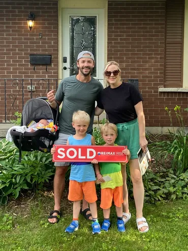 Family celebrating their home purchase