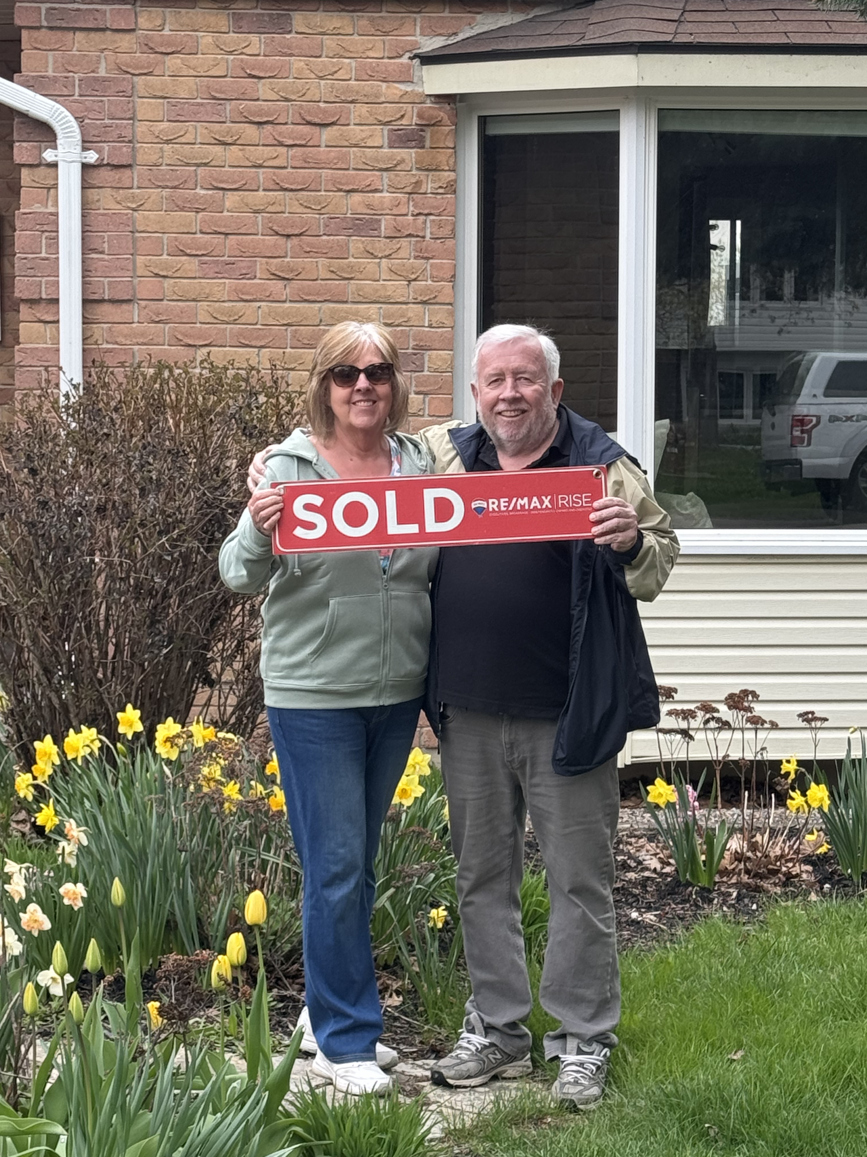 Buyers celebrating their move to Kingston